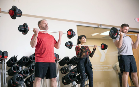 YMCA Women on Weights: Empower Your Strength Today!