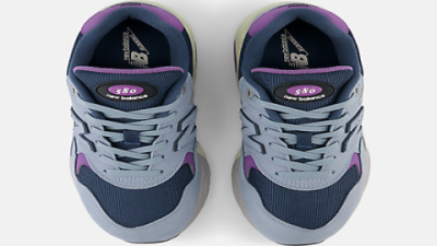 580 New Balance Black with Vintage Teal & Rollbar Stability for Comfort