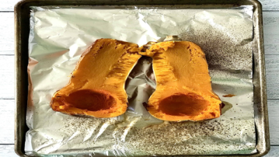 Perfect smoky flavor: Acorn squash on the grill in foil with olive oil and brown sugar