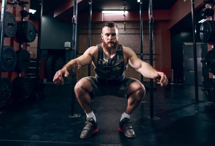 Weighted Vest Squats: Boost Strength & Build Muscle Fast